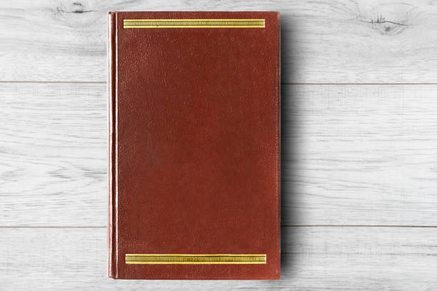 istock Book on wooden background 1139672219