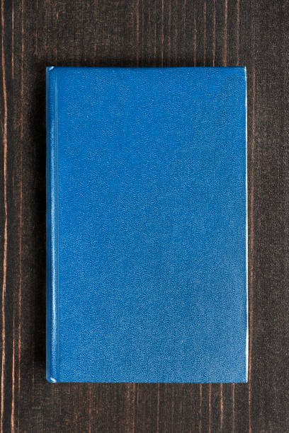 istock Book on wooden background 1139672228