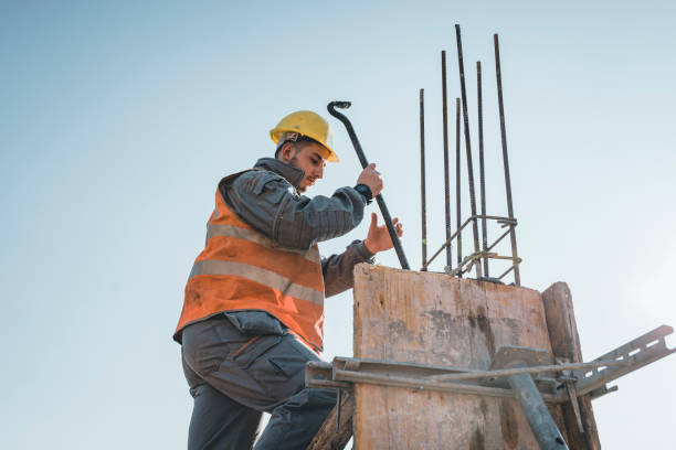 istock Building Worker is Working at the Rooftop at the Construction Site 1139674905