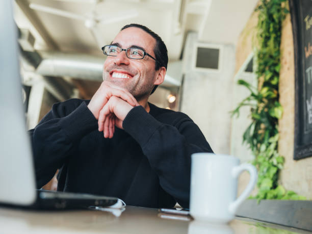 istock Caucasian man having a coffee at the small bistro 1139675172