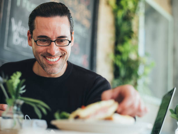 istock Caucasian man having a break at the small bistro 1139676003