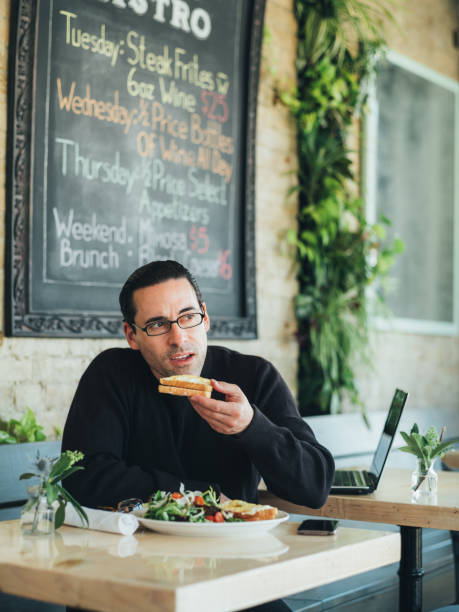 istock Caucasian man having a break at the small bistro 1139676166