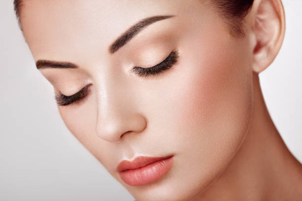 istock Beautiful woman with long false eyelashes 1139677679