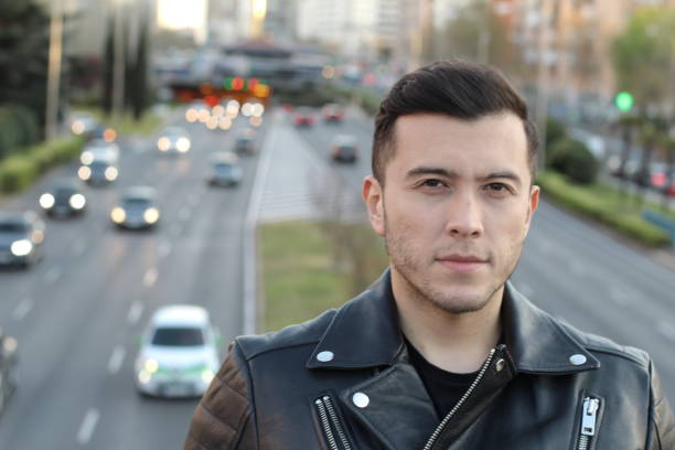 istock Cute young ethnic man in the city 1139678675