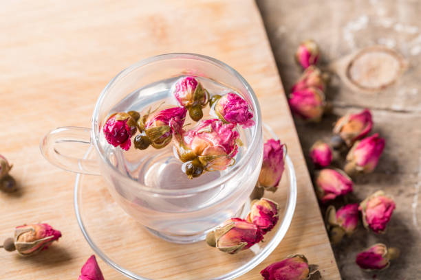 istock Herb tea with rose petals. Dry rose buds, tea cup 1139679166