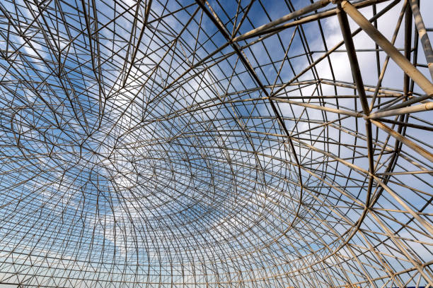 istock Circular steel structure in the blue sky and white clouds background 1139679208