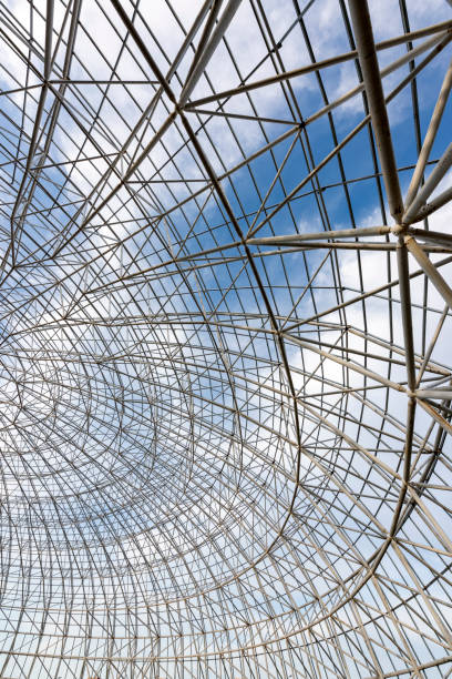 istock Circular steel structure in the blue sky and white clouds background 1139679924