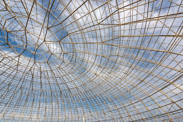 istock Circular steel structure in the blue sky and white clouds background 1139680095