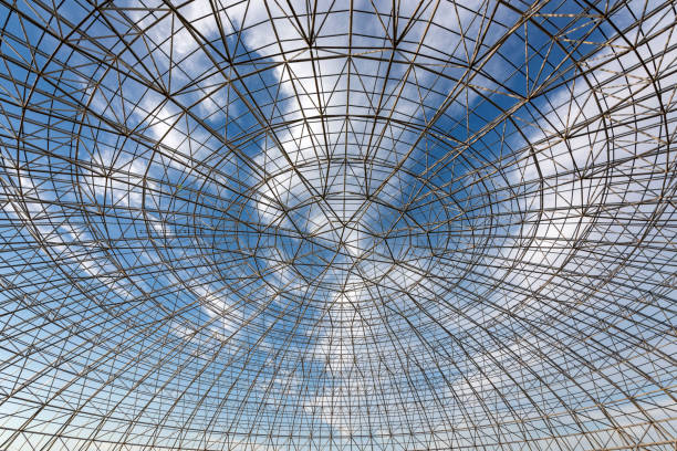 istock Circular steel structure in the blue sky and white clouds background 1139680096