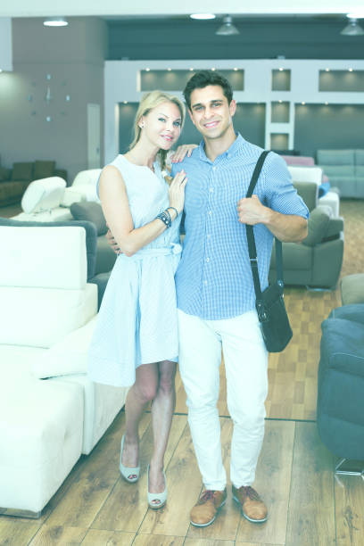 istock Smiling couple after purchase of a new sofa 1139684042