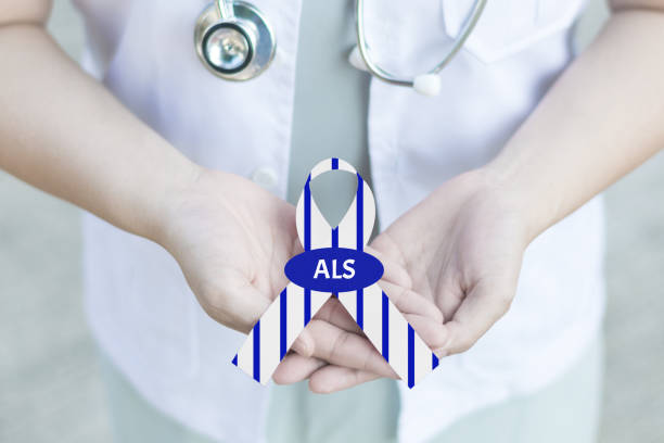 doctor in white uniform with clinical stethoscope hold stripe blue and white ribbon awareness with text stop als in hand for als or amyotrophic lateral sclerosis awareness - esclerose lateral amiotrófica imagens e fotografias de stock