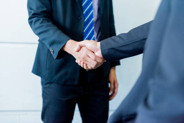 business handshake and teamwork for success and goal - specific imagens e fotografias de stock