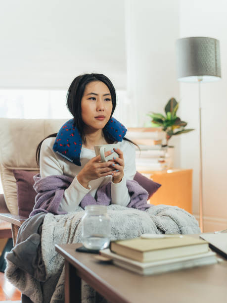 istock Young Asian woman sick at home 1139691424