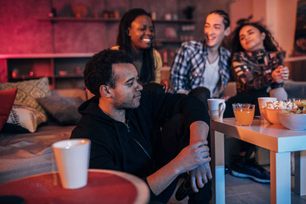 istock Group of friends relaxing at home 1139693270