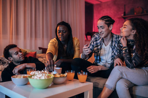 istock Friends relaxing at home 1139693360