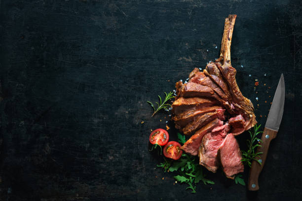istock Grilled dry aged tomahawk steak sliced as close-up 1139694550