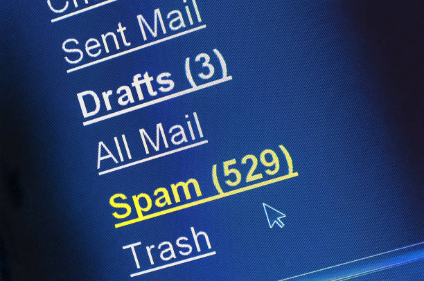 Spam e-mail box on computer screen Spam junk e-mail box on pixelated computer screen e mail spam stock pictures, royalty-free photos & images