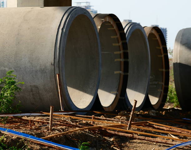 istock Asbestos pipe pile on the ground in the construction area 1139696107