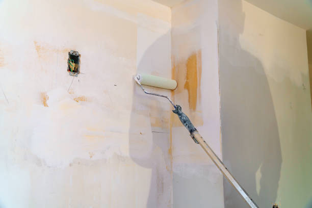 istock Painting walls, industrial worker using roller for painting 1139696214
