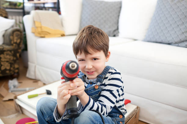 istock Father and son assembling furniture 1139698187