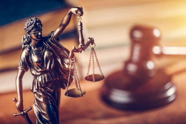 Law concept - Themis statue, judge hammer and books. Law and justice concept - Themis statue, judge hammer and books. Courtroom. law justice stock pictures, royalty-free photos & images