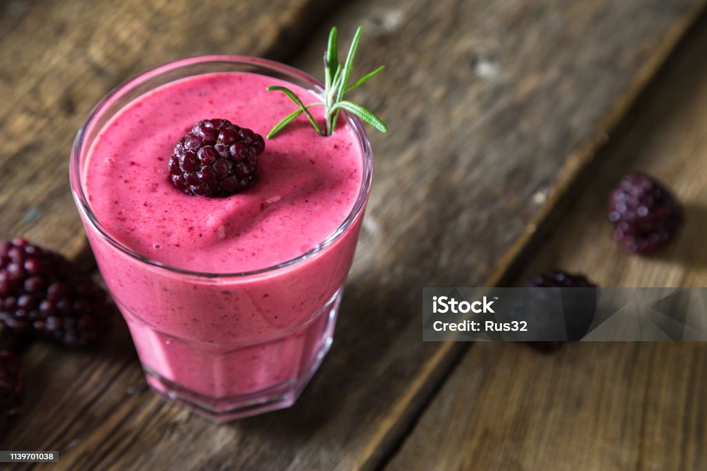 Fresh blackberry smoothies in a glass Smoothie Stock Photo