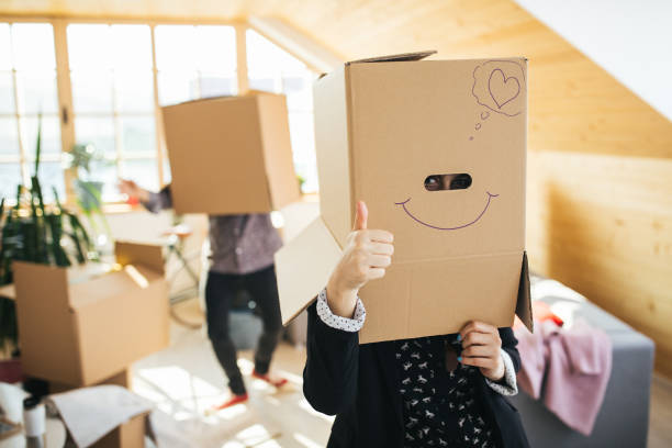 istock Funny woman with box on her head 1139702649