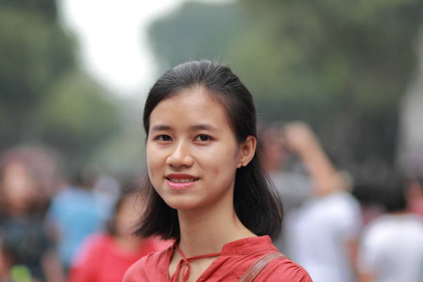 istock young woman in the crowd 1139704967