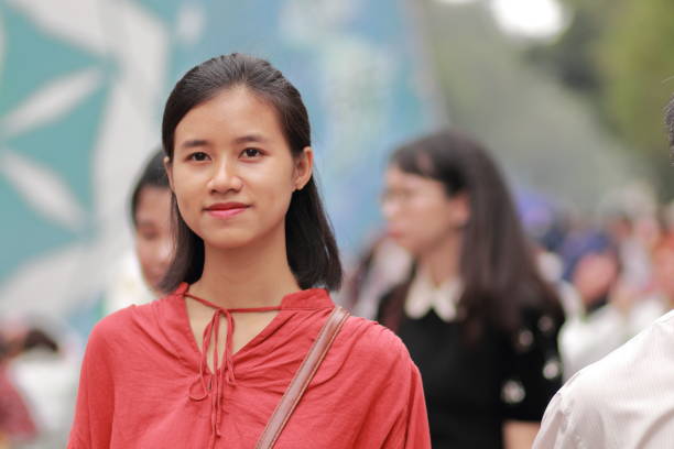 istock young woman in the crowd 1139705142