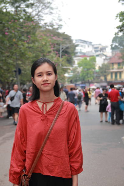 istock young woman in the crowd 1139705389