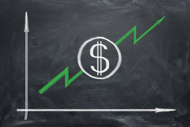 istock Growing graph use with green arrow on blackboard painting chalk. 1139707077