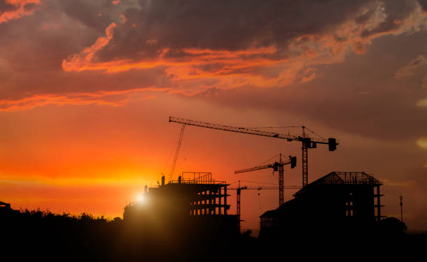 istock Silhouette Construction Site and Abandon building with sunset background. 1139708649