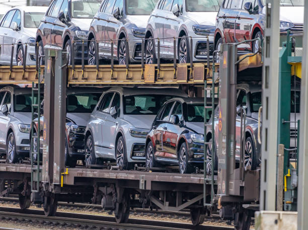 an open transport wagon with a large number of cars - turbo diesel imagens e fotografias de stock