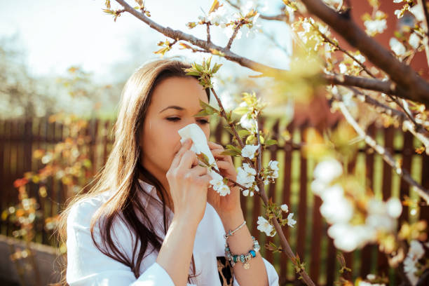 istock Woman blowing nose 1139713199