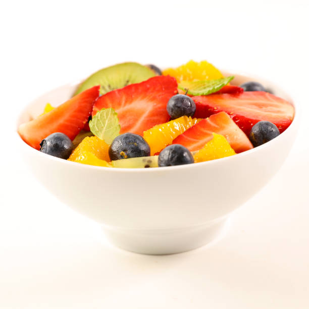 istock bowl fruit salad isolated on white background 1139713208