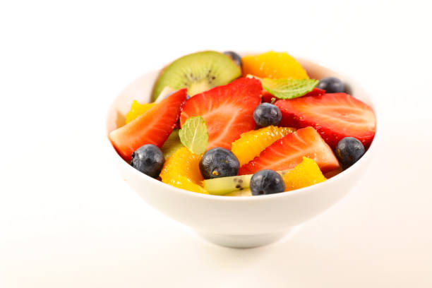 istock bowl fruit salad isolated on white background 1139713209