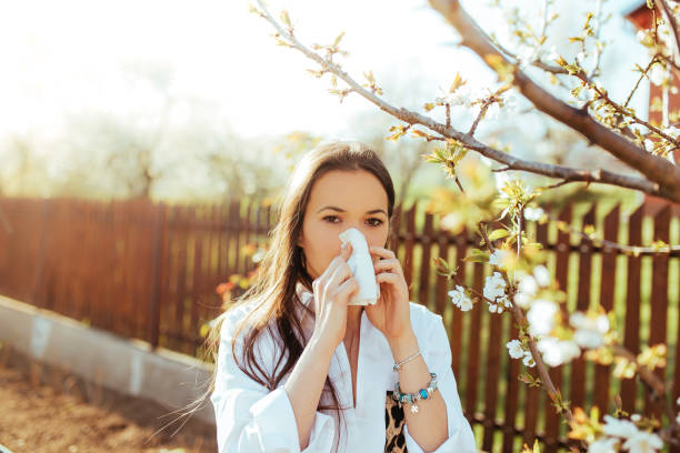 istock Woman blowing nose 1139713263