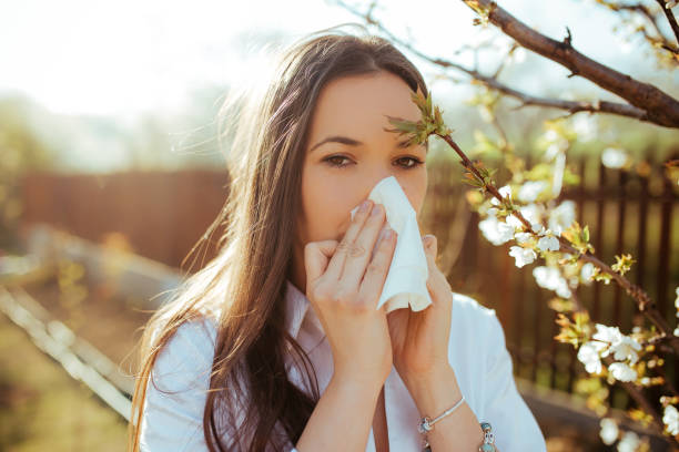 istock Woman blowing nose 1139713478