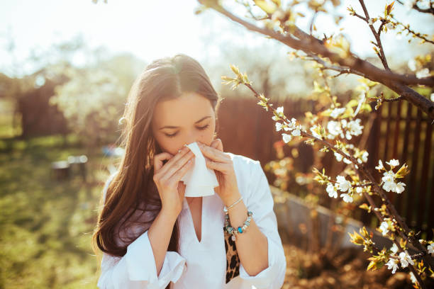 istock Woman blowing nose 1139713668