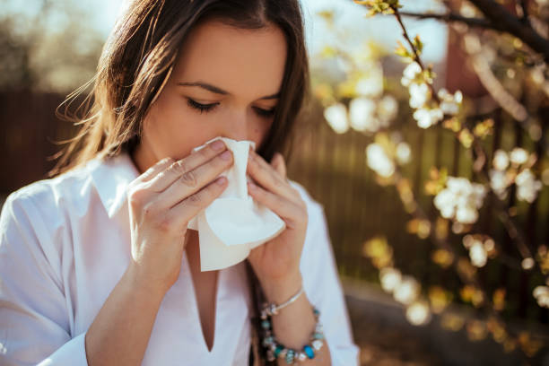 istock Woman blowing nose 1139713979