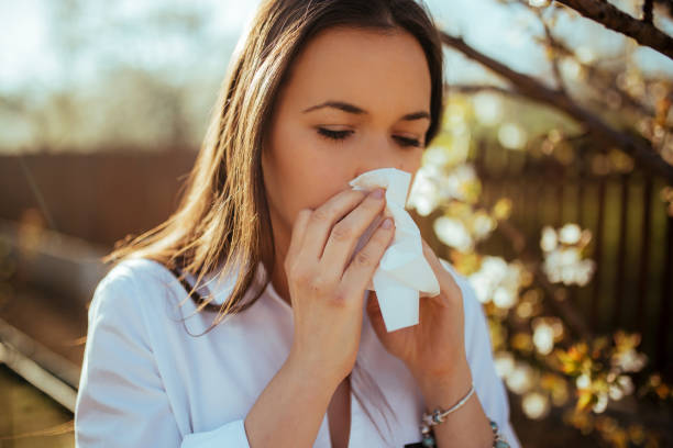 istock Woman blowing nose 1139714752