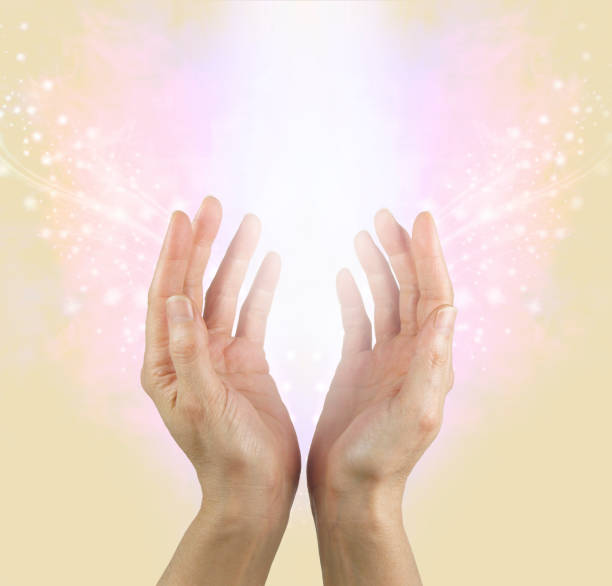 istock Gentle Hands and Healing Resonance Light Shaft 1139714878