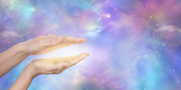 istock Female Healer Sending Cosmic Healing Energy Background 1139714898