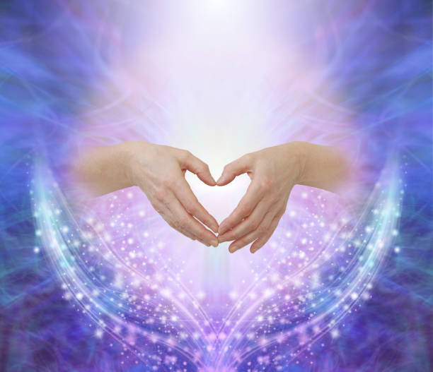 istock Healer's hands making a humble heart shape 1139715085