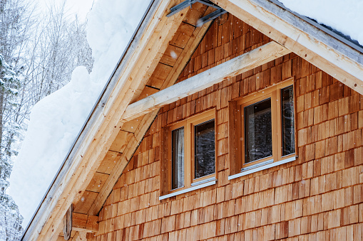 Windows and roof of House architecture snowy winter Bad Goisern