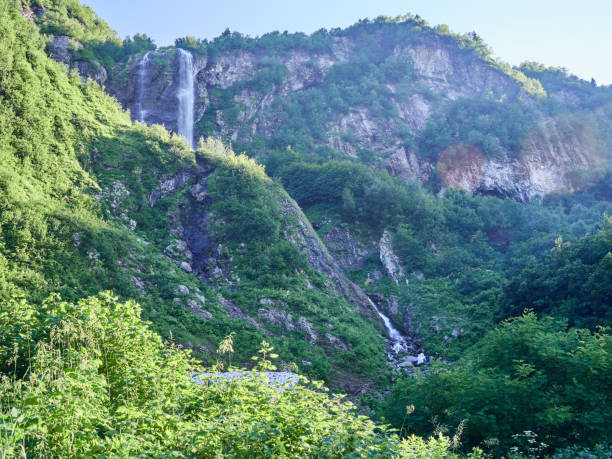 istock A powerful mountain stream flows down from the rocks and stones. 1139717123