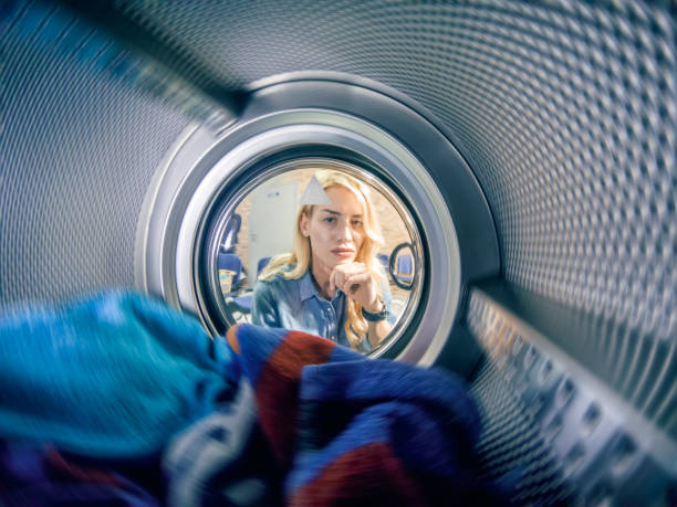 istock Young woman having a laundry day 1139717524