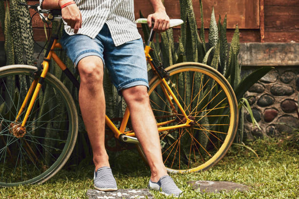 istock Attractive man standing with old bicycle. 1139719824