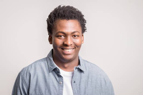 istock African American man smiling on gray background 1139722902