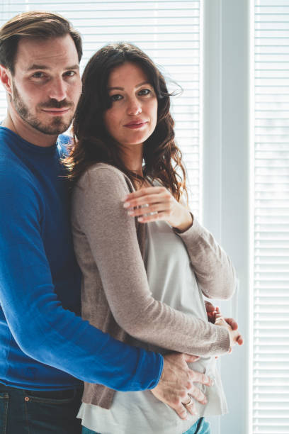 istock Mid adult couple looking at camera 1139724701